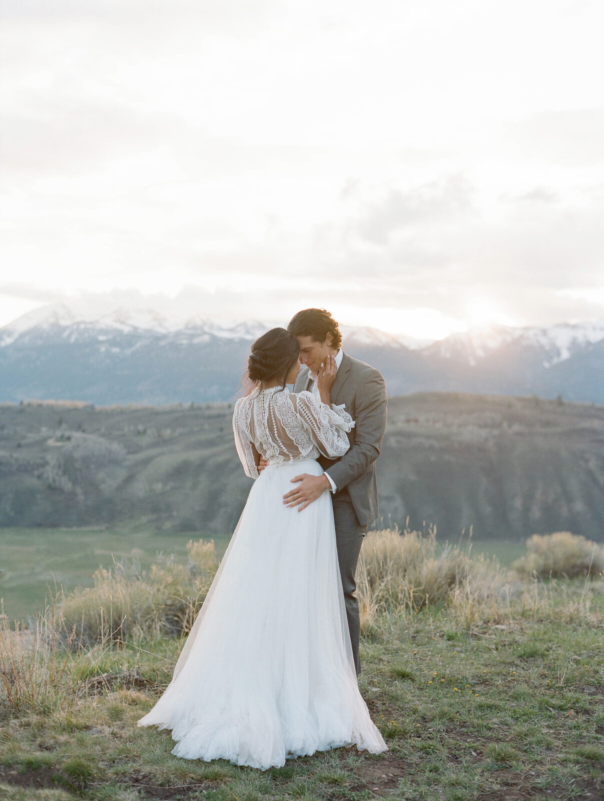 Beautiful couple on top of the mountains in Jackson hole and glad she chose the best makeup artist.