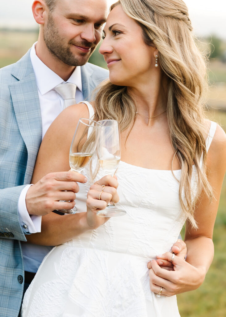 Newlyweds on the mountain with beauty done by a premier Jackson Hole makeup artist team.