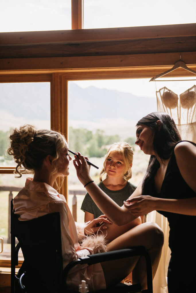 Bride getting wedding glam done in Jackson Hole