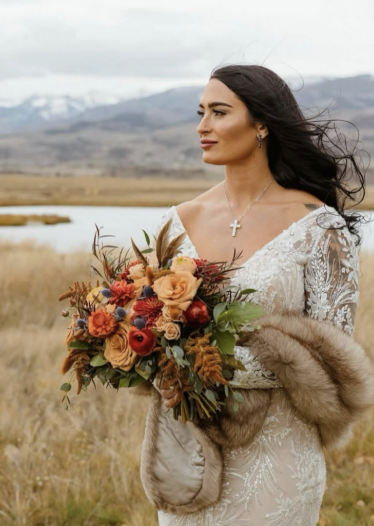 Beautiful bride in the mountains after getting her luxury airbrush spray tan in Jackson Hole.
